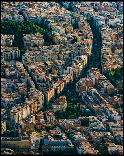 Ein Poster von einer langen Straße die durch die Innenstadt von Barcelona führt.